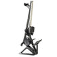 Black and silver Hydrow Wave rowing machine with tall vertical rail, footplate, and seat on white background