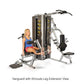 Woman using silver and black multi-gym with leg extension attachment, demonstrating exercise position on fitness equipment