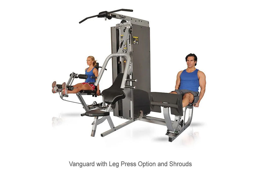 Inflight Vanguard 2-stack multi-gym with leg press option and shrouds, demonstrated by two people on white background