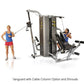 Inflight Vanguard 2-stack multi-gym with cable column and shrouds, shown with two models demonstrating lat pulldown and leg p