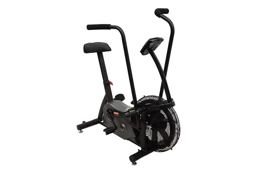 Black upright stationary air bike with dual handles, padded seat, and large fan wheel on white background