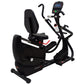 Black recumbent cardio strider with digital console, foot pedals, and padded seat on white background