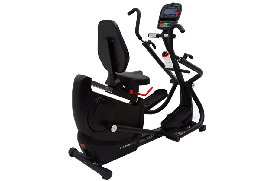 Black recumbent cardio strider with digital console, foot pedals, and padded seat on white background