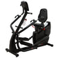 Black upright cardio strider with padded seat, dual handlebars, and digital console on white background