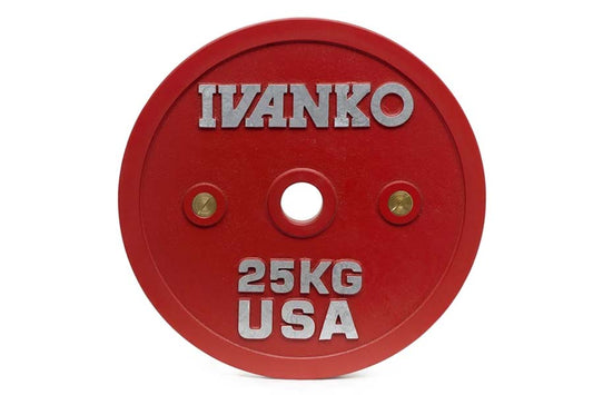 Red 25kg Ivanko bumper plate with silver text and brass bushings, flat lay on white background