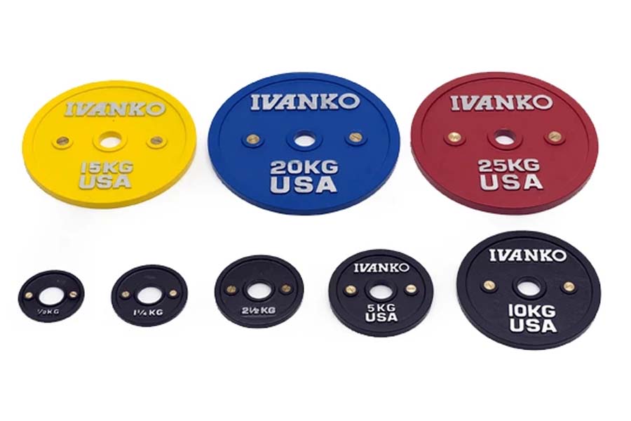 Ivanko color bumper plates in various weights, including yellow 15kg, blue 20kg, red 25kg, and black plates in smaller denomi