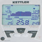 Kettler Coach E rowing machine console with blue digital display showing strokes, pulse, brake, distance, power, time, and en