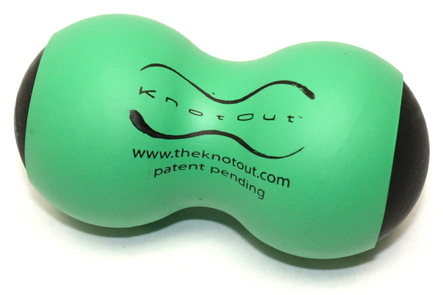 Green and black foam roller with wavy hourglass shape, "knotout" branding and website text printed on surface