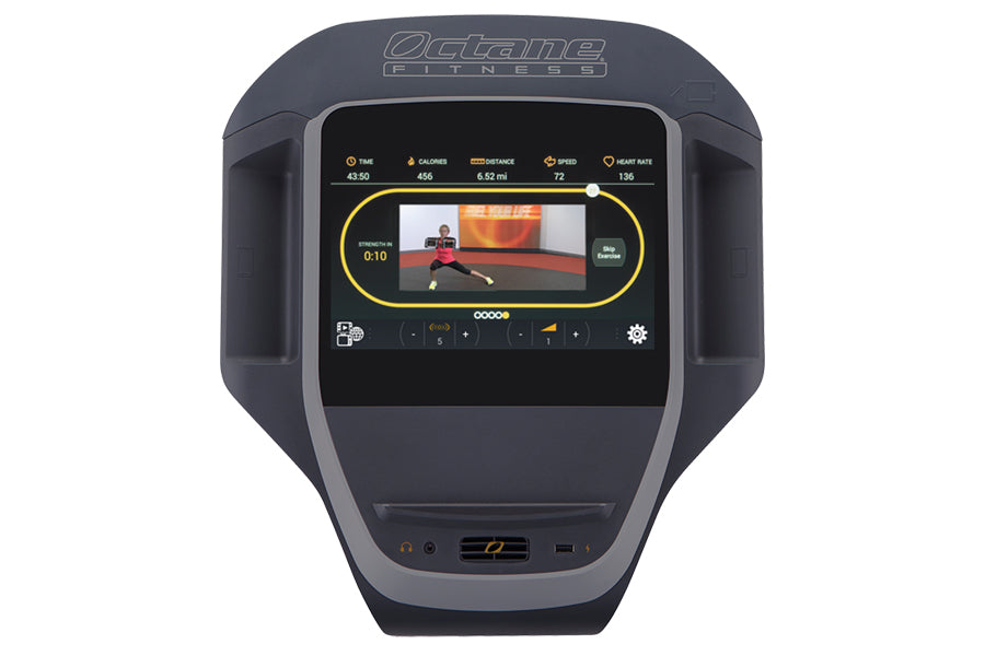 Octane LateralX exercise machine with touchscreen console displaying workout video and fitness metrics on white background