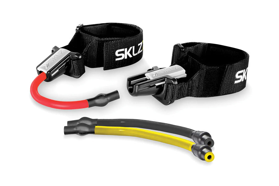 SKLZ Lateral Resistor Pro resistance bands set with black nylon ankle straps, red and yellow tube bands, and metal connectors