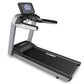 Landice L7 treadmill with silver frame, black running deck, digital display console, and handlebar controls on white backgrou