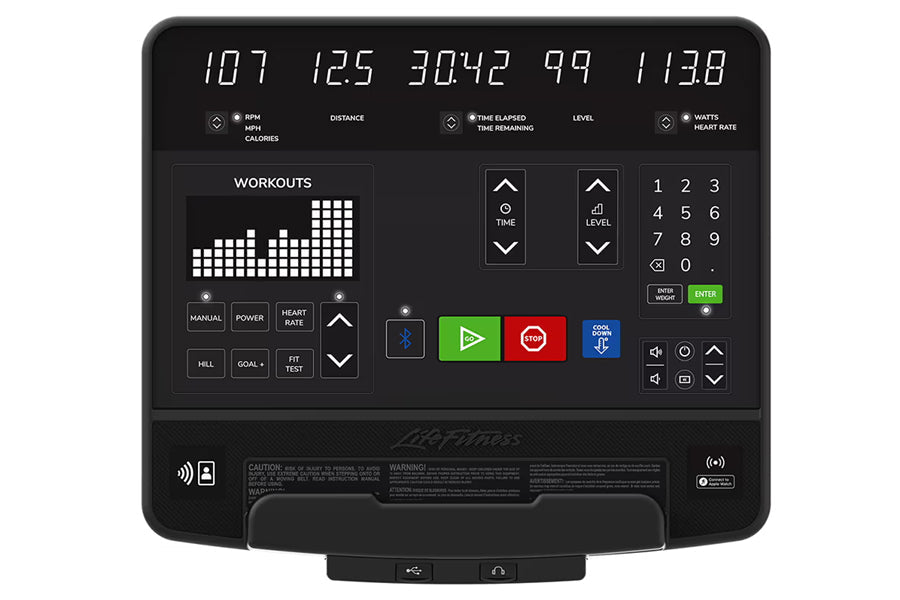 Life Fitness black elliptical machine with digital display showing workout metrics, buttons, and touchscreen controls on dark