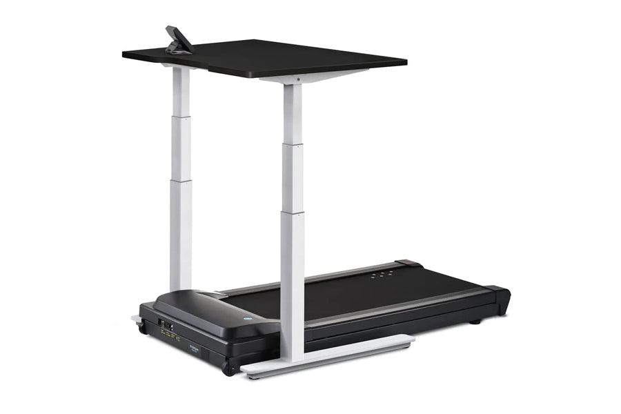 LifeSpan TR1000-Omni black and silver desk treadmill with upper work surface and adjustable legs on white background