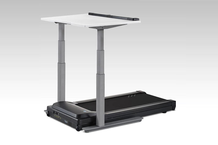 LifeSpan power treadmill desk with white top, gray adjustable columns, and black motorized treadmill base on gray background