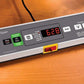 LifeSpan TR1200-GlowUp under desk treadmill with digital display showing 628, green start button, and control panel on wooden
