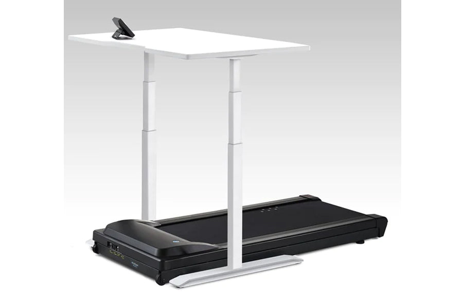 White adjustable desk with black treadmill base and silver frame, smartphone holder mounted on white surface, shown against g