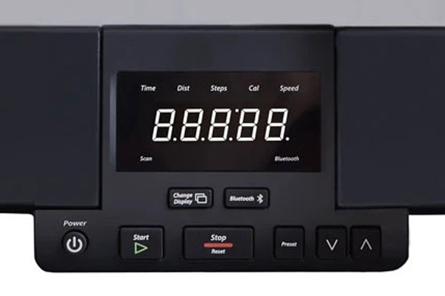 Black treadmill desk console with LED display showing time, distance, steps, calories and speed metrics, with power, start, s