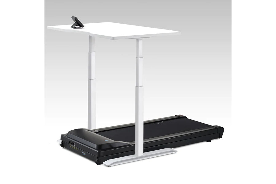 White desktop treadmill desk with black treadmill base, white support columns, and control panel on gray background