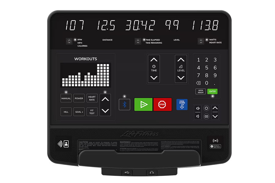 Life Fitness Club Series Plus recumbent exercise bike with digital console displaying distance, time, heart rate, and workout
