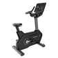 Black upright stationary exercise bike with digital console display, padded seat, handlebar grips, and gray base on white bac