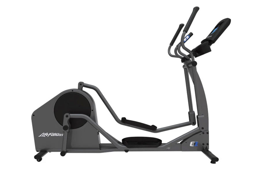 Life Fitness E1 elliptical cross-trainer with gray frame, black foot pedals, and dual handlebar grips on white background