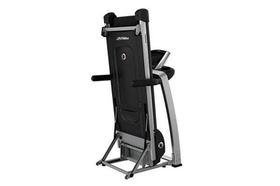 Life Fitness F3 folding treadmill with black running deck, silver frame, and handrails on white background