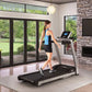 Woman running on Life Fitness F3 folding treadmill with black belt and silver frame in modern home gym