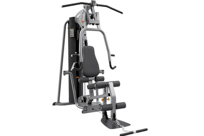 Life Fitness G4 home gym machine with black padded seat and handles, silver frame, multiple resistance arms, on white backgro