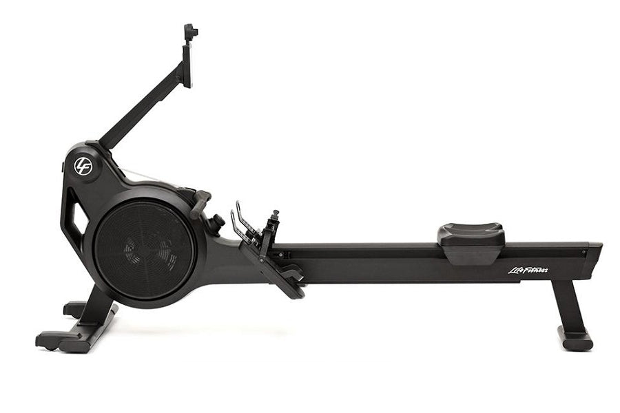 Black Life Fitness Heat Row rowing machine with adjustable resistance wheel, extended arm and monitor display on white backgr