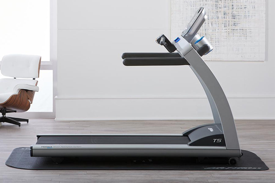 Life Fitness T5 treadmill with gray frame and black running belt in home office setting
