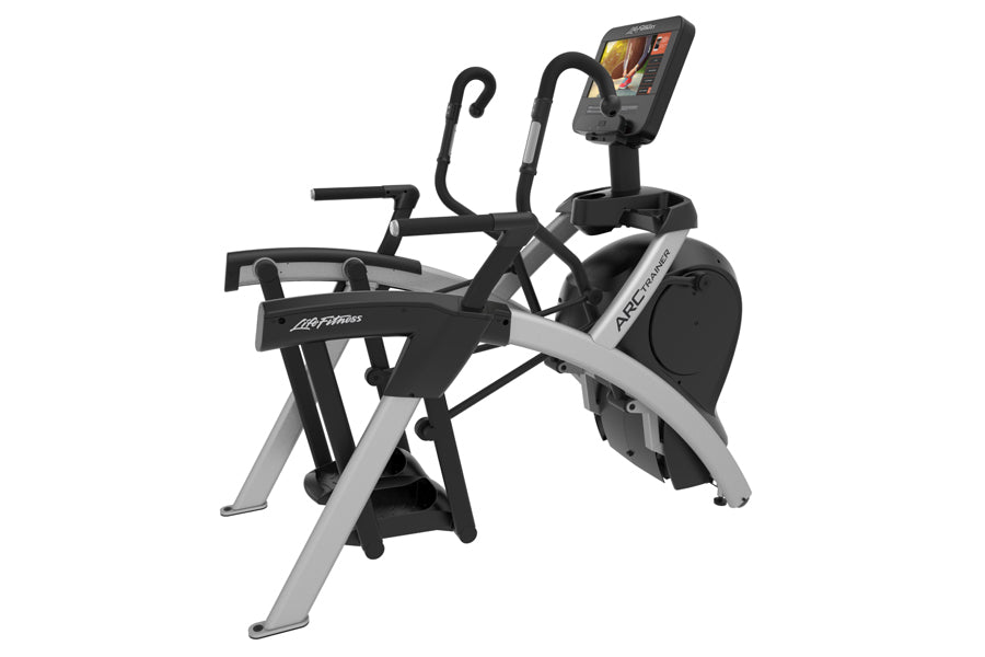 Life Fitness Club Series Total Body Arc Trainer elliptical with black and silver frame, digital display console, and curved h