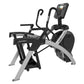 Life Fitness arc trainer with black and silver frame, curved handles, footplates, and digital console on white background