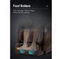 Brown massage chair with transparent panels showing foot roller mechanism with blue massage nodes on dark background