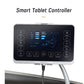 Black smart tablet controller with blue LED display showing body massage zones and 30-minute timer, mounted on white stand