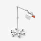 LightStim ProPanel LED light therapy lamp with white adjustable arm and rolling base, featuring orange-accented panel head on