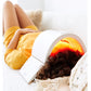 Woman wearing yellow socks using white Lightstim Elipsa light therapy face lamp with glowing red and yellow light panel on wh