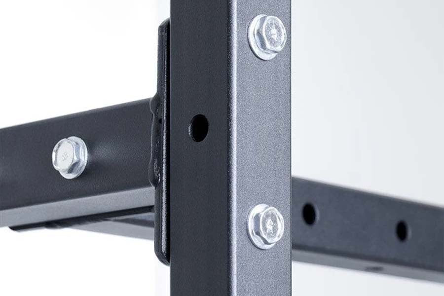 Black metal weight storage rack with silver hardware and brand logo, showing vertical post and horizontal bar connection on w