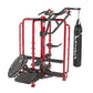 Red and black commercial workout cage with pull-up bar, heavy bag attachment, and dual-sided leg press machine on white backg