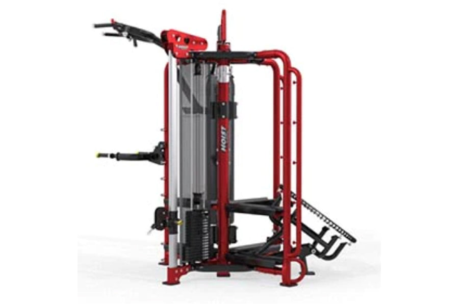 Red and black multi-station fitness equipment with cable machines, leg press, and pull-down attachment on white background