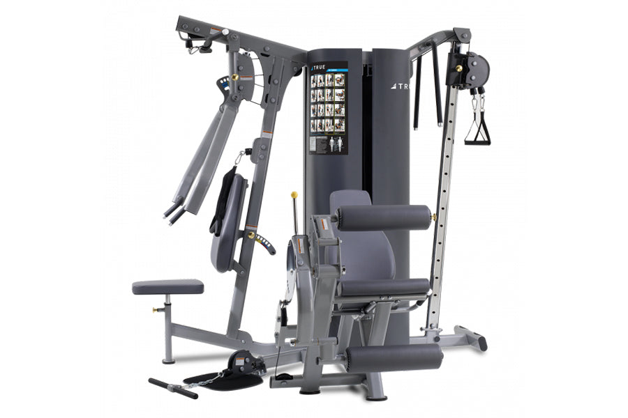 TRUE MP 3.0 multi-station gym equipment with gray frame, black padded seat, dual cable arms, and leg press attachment on whit