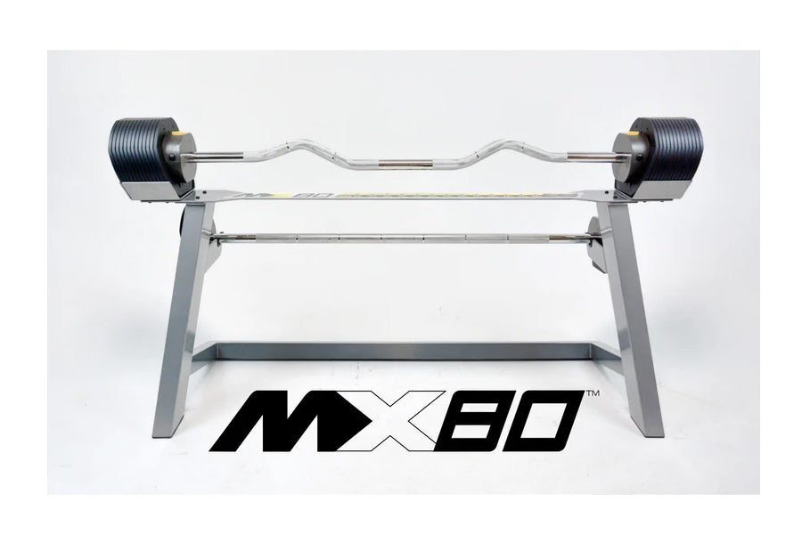 MX80 rapid change adjustable barbell system with wavy curl bar, black weight plates, and gray steel frame on white background