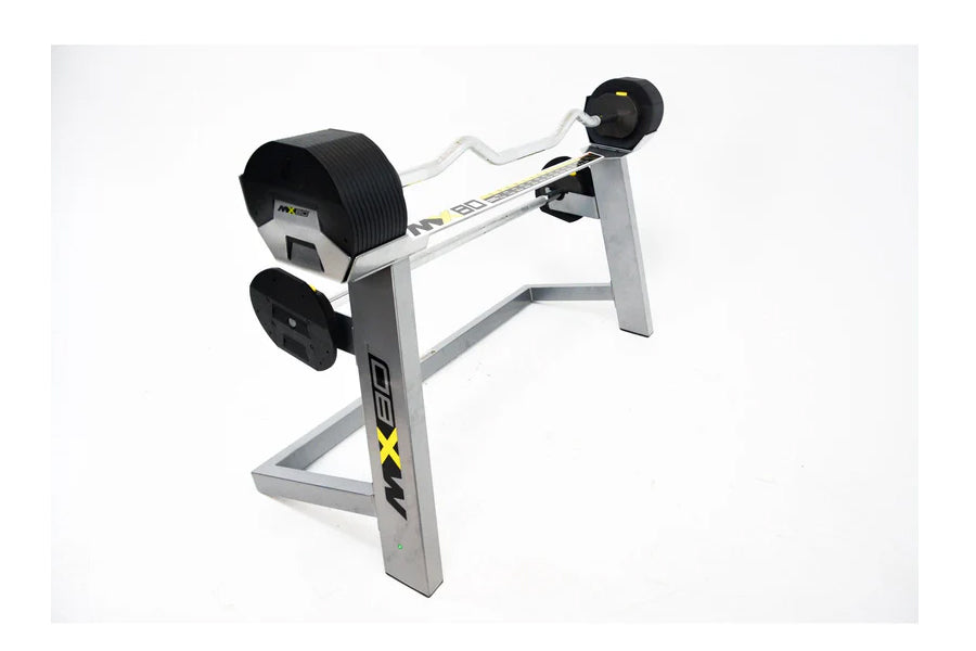 MX80 adjustable barbell system with white frame, black weight plates, and rapid change mechanism on white background
