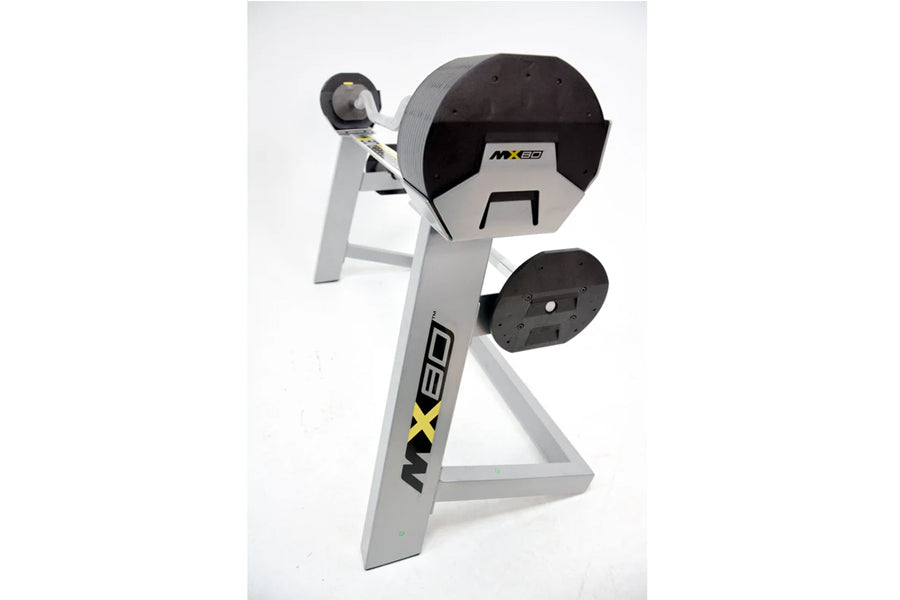 MX80 gray and black adjustable dumbbell system with rapid change mechanism and curved curl bar attachment on white background
