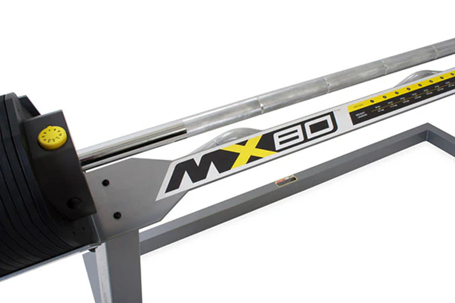 MX80 rapid change adjustable barbell system with yellow and black accents, chrome shaft, and quick-change weight collar on wh