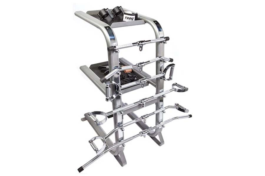 Troy Warrior Machine bar and cable accessory rack with silver frame, storage shelves, and chrome handles on white background