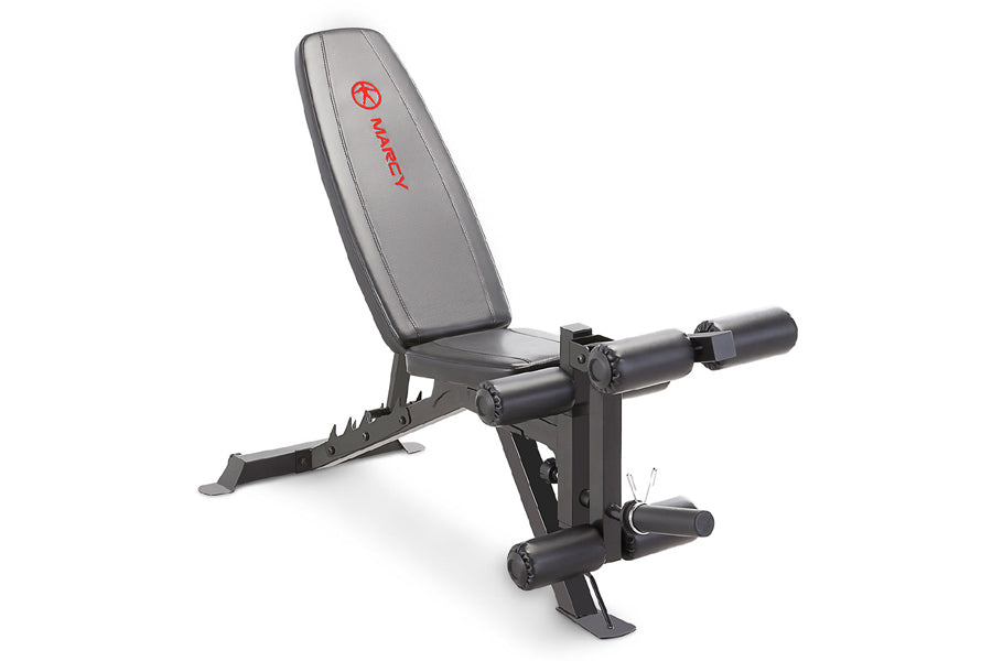 Marcy Deluxe Utility Weight Bench with gray padded seat, black metal frame, and leg extension attachment on white background