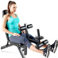Woman in turquoise tank top and navy leggings seated on black leg extension weight bench with foot pedals, holding dumbbell, 