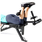 Person exercising on black Marcy utility weight bench with leg extension attachment, wearing navy leggings and black sneakers