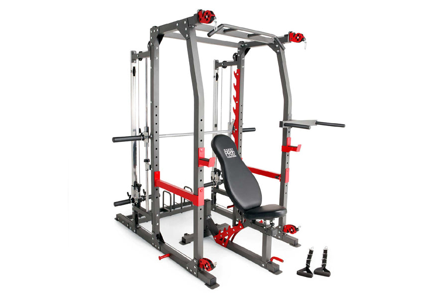 Marcy Pro Smith Machine home gym with gray steel frame, red accents, black bench seat, and safety stops on white background