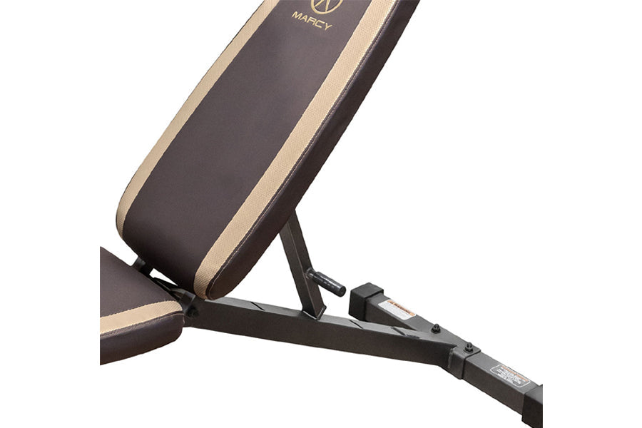 Marcy adjustable weight bench with black and tan padded seat back, black metal frame, angled view on white background